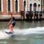 In Venice, tourists were fined for surfing on the canal